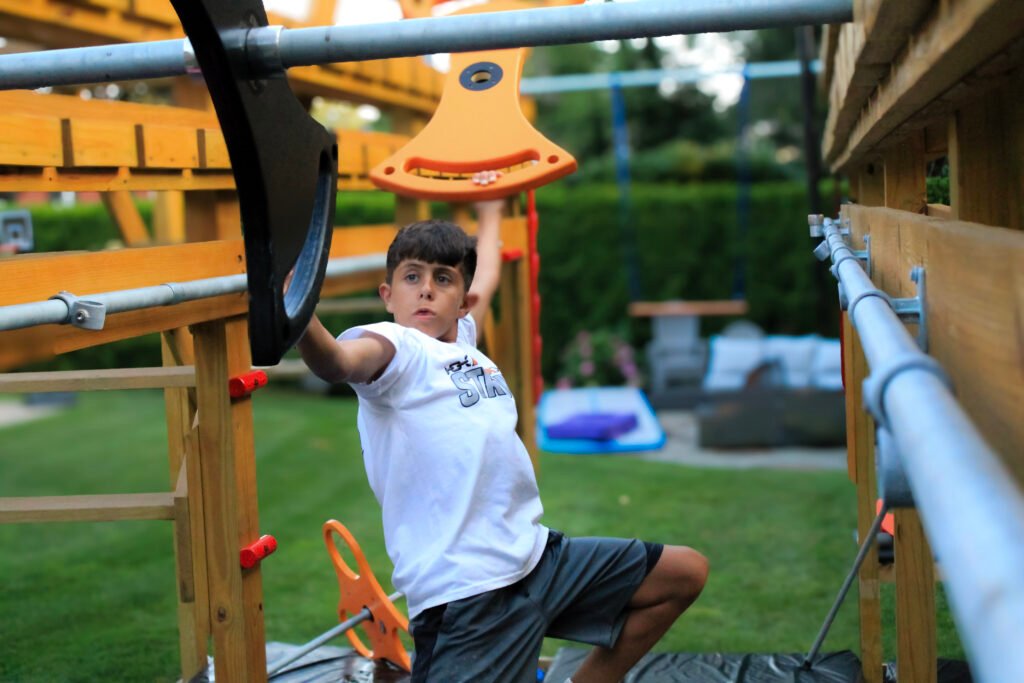 boy grabbing battle axe
